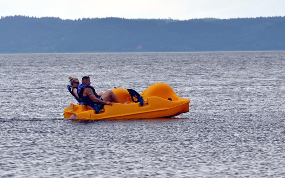 Two beachgoers paddle a boat out into Lake Ogawara on Misawa Air Base, Japan, on Sunday.