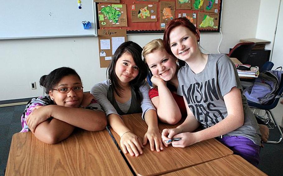From left: Tesha Kidd, Riko Koreen, Taylor Michael and Paige Hicks pose for a picture in the 'Girls Having Fun' club at Yokota Middle School in Japan.