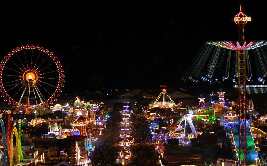 The festival grounds with carnival lights make for a pretty nighttime view at Oktoberfest.