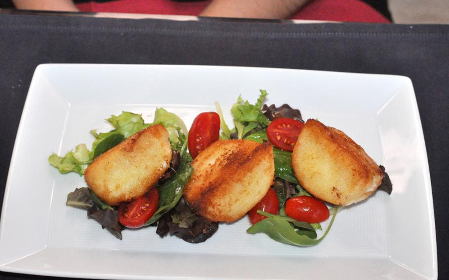 This might look like potatoes, but  it's actually fried buffalo mozzarella cheese with tomatoes and greens. It was one of a handful of appetizers offered during a recent visit to Vineria.