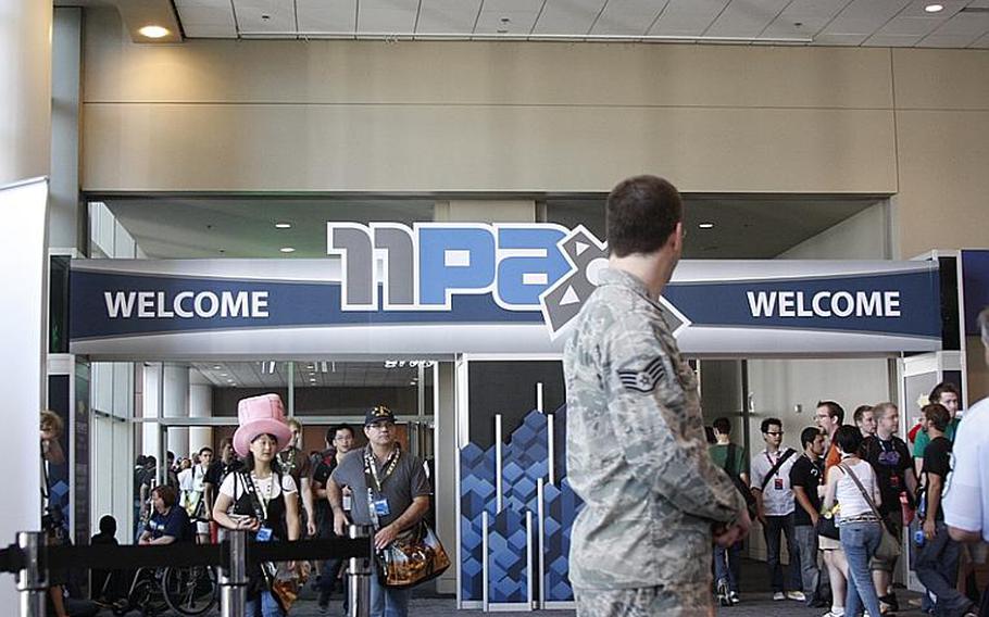 Staff Sgt. Alan Servello, 30, mans the Air Force Reserve recruiting booth at PAX. Servello and Terpening said they had talked to a handful of interested gamers.