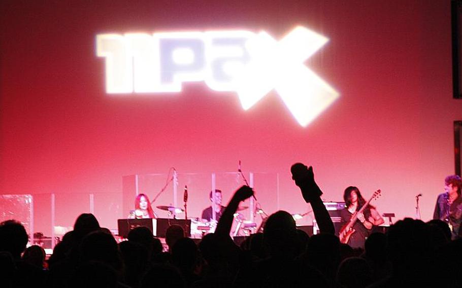 Gamers rock out Aug. 30 during one of the late-night concerts at PAX Prime in Seattle.