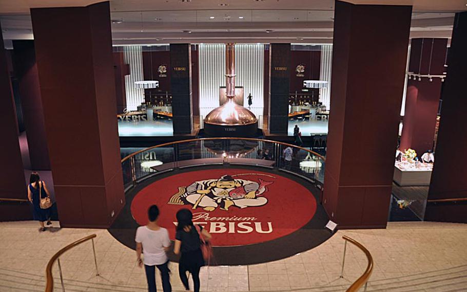 A carpet at the Yebisu museum is adorned with the image of Yebisu, the Japanese god of fishermen, luck, the working man and guardian of health and small children.