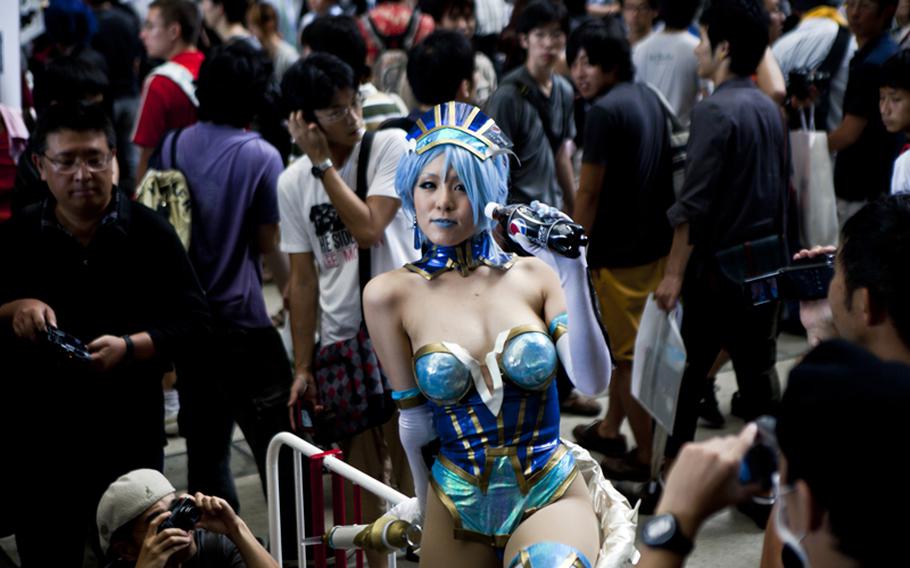 Although the games were the top draw, there were plenty of side attractions, including the scantly clad "cosplayers" who provided a side attraction at Saturday&#39;s Tokyo Game Show 2011 at Chiba Prefecture&#39;s Makuhari Messe convention center.