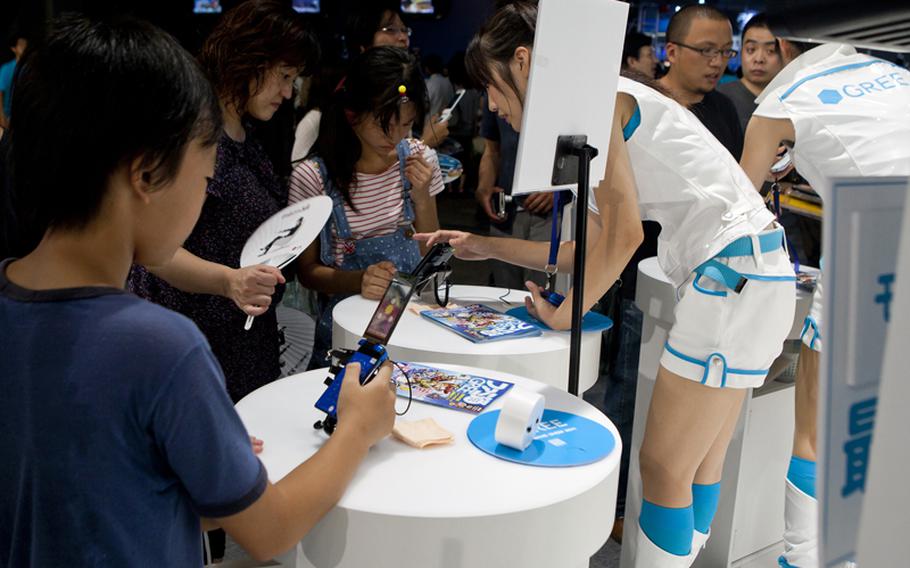 Social networking service Gree, Inc. showed up in a big way with a rather large booth at this year&#39;s Tokyo Game Show held at Chiba Prefecture&#39;s Makuhari Messe convention center.