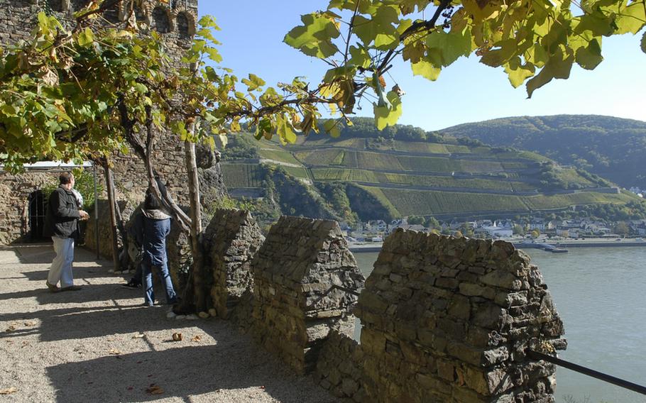 Visitors to Burg Rheinstein take in the sweeping views of the Rhine River and hillside vineyards. Built in the early 10th century, the castle is full of charm -- and perhaps a ghost or two.
