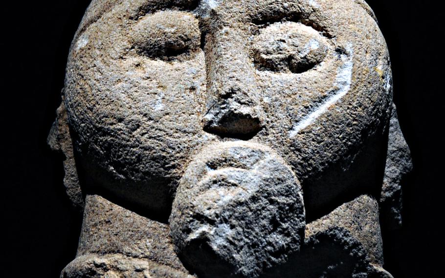 The head of a statue is among the items displayed at the Keltenwelten am Glauberg museum northeast of Frankfurt, Germany.