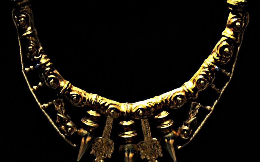 A decorative gold necklace found in a Celtic ruler's grave is among the items displayed at the Keltenwelten am Glauberg museum.