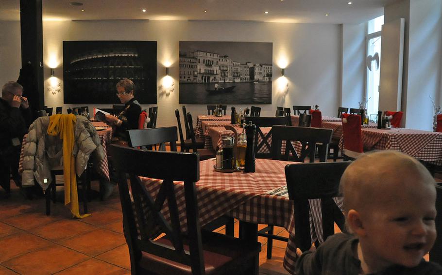 An Italian couple enjoys lunch at Casa Italia restaurant while on a visit to the heart of Bamberg, Germany. The restaurant/hotel is located in Bamberg's old city.