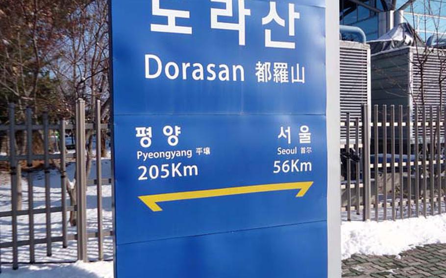 The station and the people of South Korea patiently await the day when the north opens up and the two nations are reunited. Here, a sign on the platform outside that gives the distance to the two capitals serves as a reminder of that hope.
