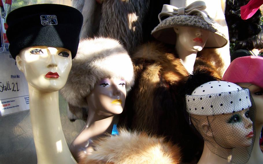 Classy chapeaus of all types for the fashion-conscious are among the clothing items sold at the Portobello Road Market. And, if you're in the market, there are even some fur wraps and coats you can buy to go with your new hat.