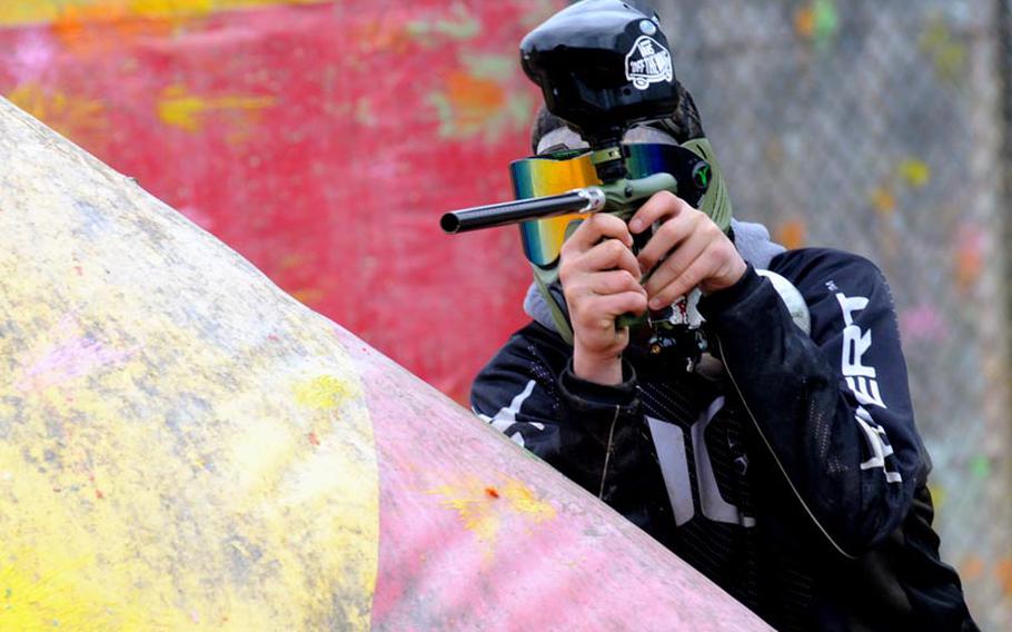 A player takes aim at the opposing team during a Feb. 25, 2012, paintball match at Kadena Air Base, Okinawa. The Ryukyu Kings paintball team was training for a tournament in Thailand.