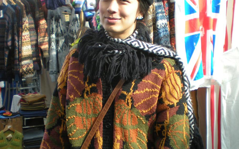 Today's fashionable market trader could be a top name designer of tomorrow. This young lady was showing her designs at the Borough Market.