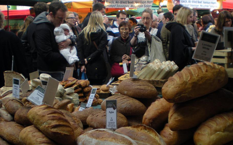 Artisan breads, piled high at Borough Market, will disappear by the end of the day.