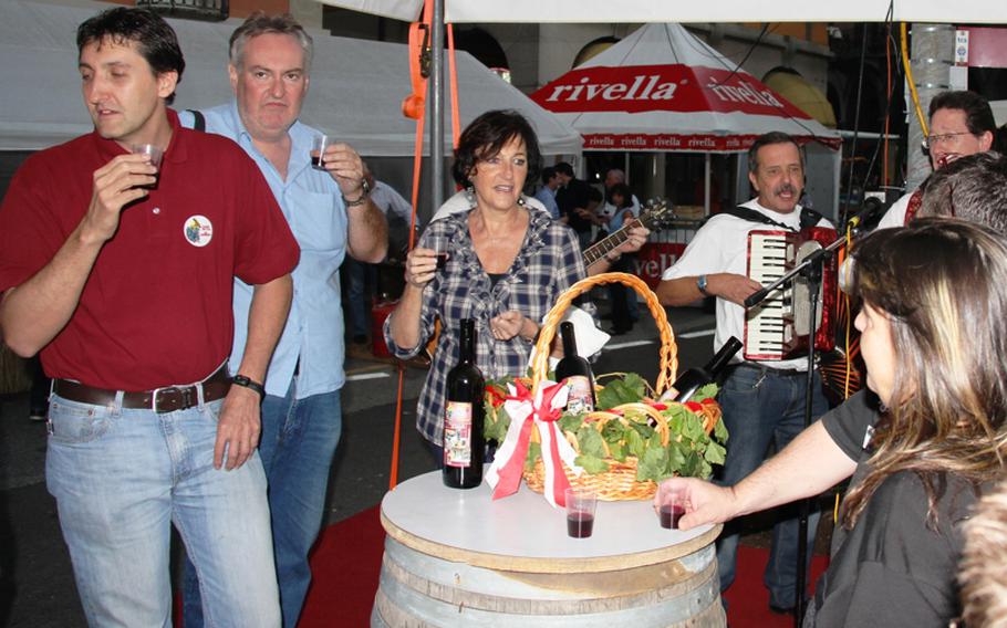 Wine lovers gather to savor the drink and enjoy some music at the Sagra dell'Uva annual grape festival.