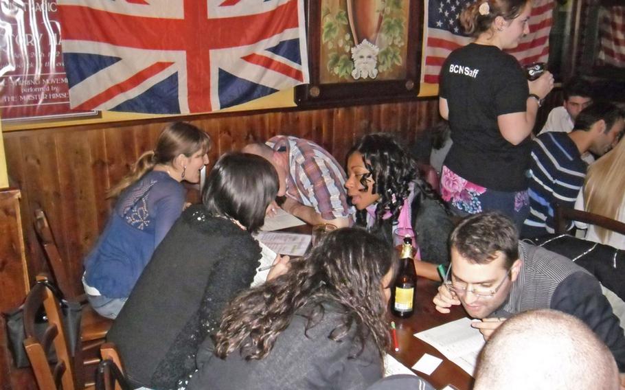 Members of the social club British Community gather at Morrigan Pub in the Vomero district of Naples, Italy. The Morrigan Pub gathering now draws about 100 people weekly. The group also gathers in Pozzuoli at the Druid Irish Pub.