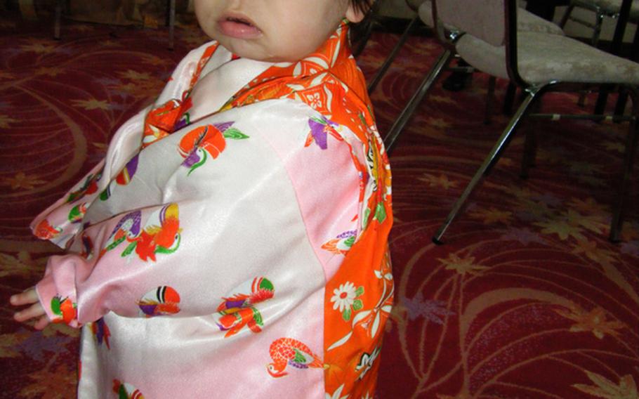 The author's granddaughter also wore traditional garb for the wedding. 