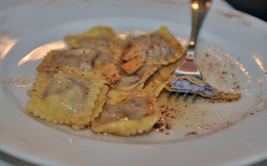 A few of the offerings at Antica Osteria Al Forno are a bit unusual, such as this first course of ravioli with bacon and blueberries, sprinkled with cinnamon.