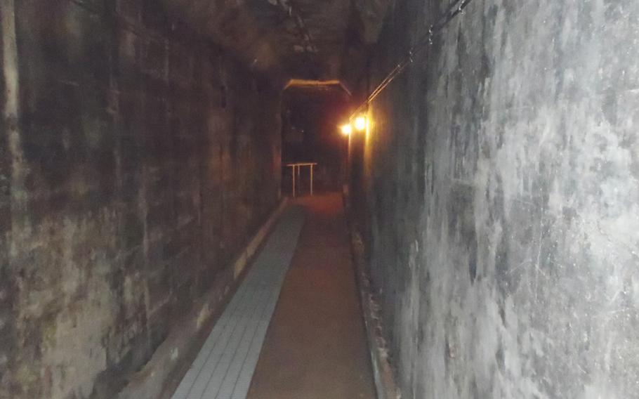 A burned-out corridor in the underground bunker complex that served as the air defense command center for most of southern Japan during World War II. Located near Sasebo Naval Base, the complex has been virtually left the same as it was after it was discovered and burned by American forces at the end of the war. The Japan Maritime Self-Defense Force operates a base on the ground above most of the site and sometimes gives tours of the complex.