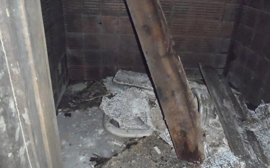 Imperial Japanese officers were given some privacy in this bathroom stall in the air defense command center that served most of southern Japan during World War II. Debris has since fallen into the toilet. 
Matthew M. Burke/Stars and Stripes