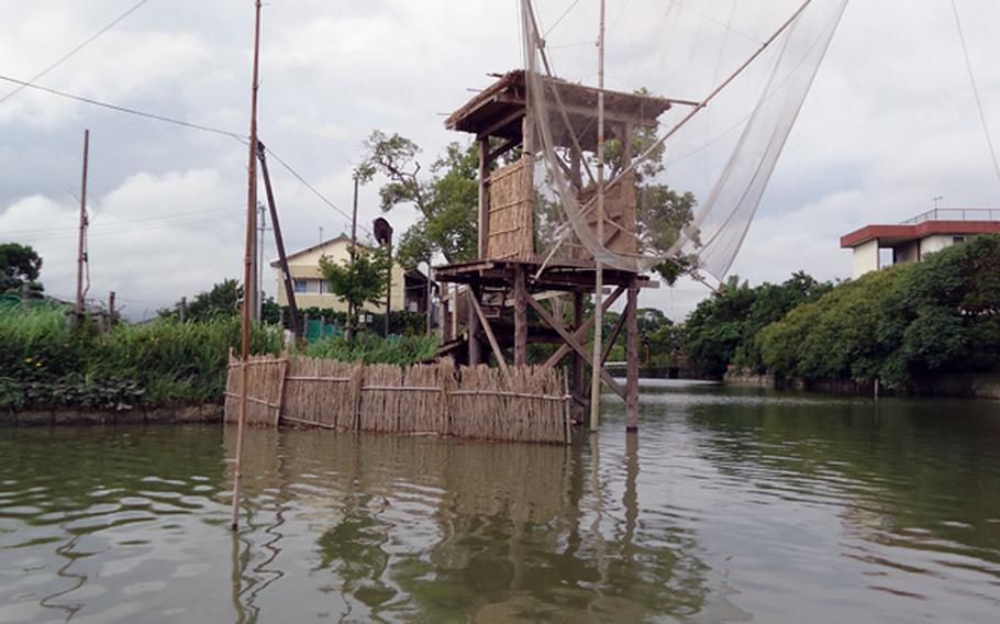 The culture and the economy of Yanagawa revolve around the water, and the city is known for eel and seaweed. This fishing platform and nets are part of the Yanagawa Kanko Kaihatsu tour of the waterways.