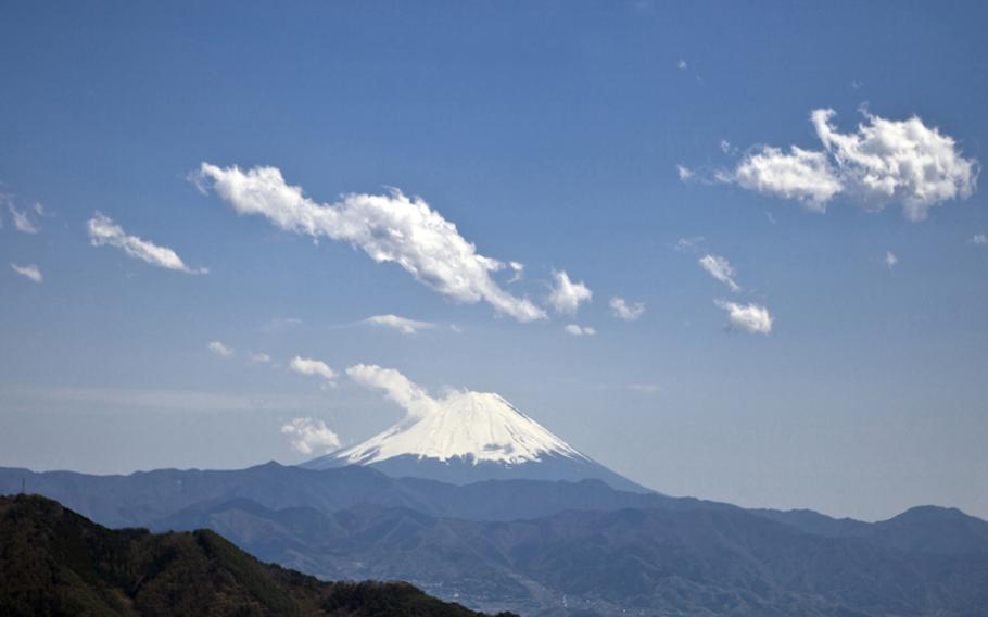 The peak of Mount Yasaburo-take offers a great view of Mount Fuji and Japan's Southern Alps on a clear spring day. This is one of the incredible places to visit in Shosenkyo Valley in Japan. 