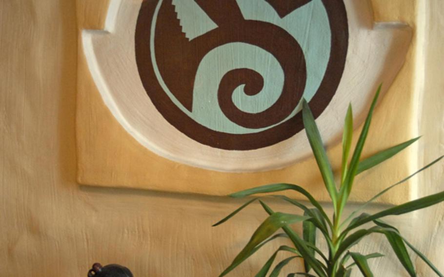 Manitou's interior has many traditional decorations honoring Native American culture.