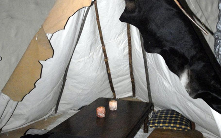 Sitting on the floor in a teepee is one of the ways to enjoy your meal at Manitou in Frankfurt, Germany.