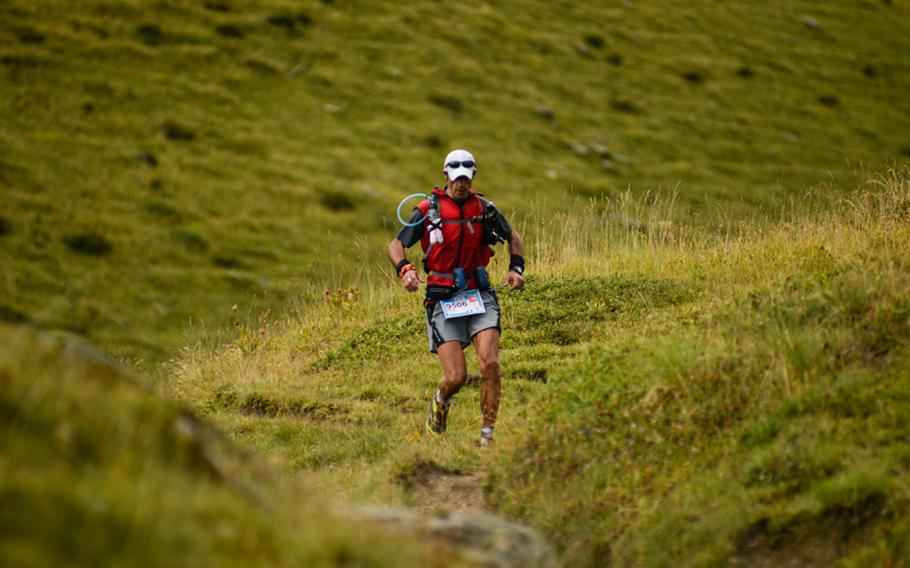 A competitor in the 71-mile race through the Mont Blanc massif hits his stride after descending one of the five peaks that the racers had to climb during the race.