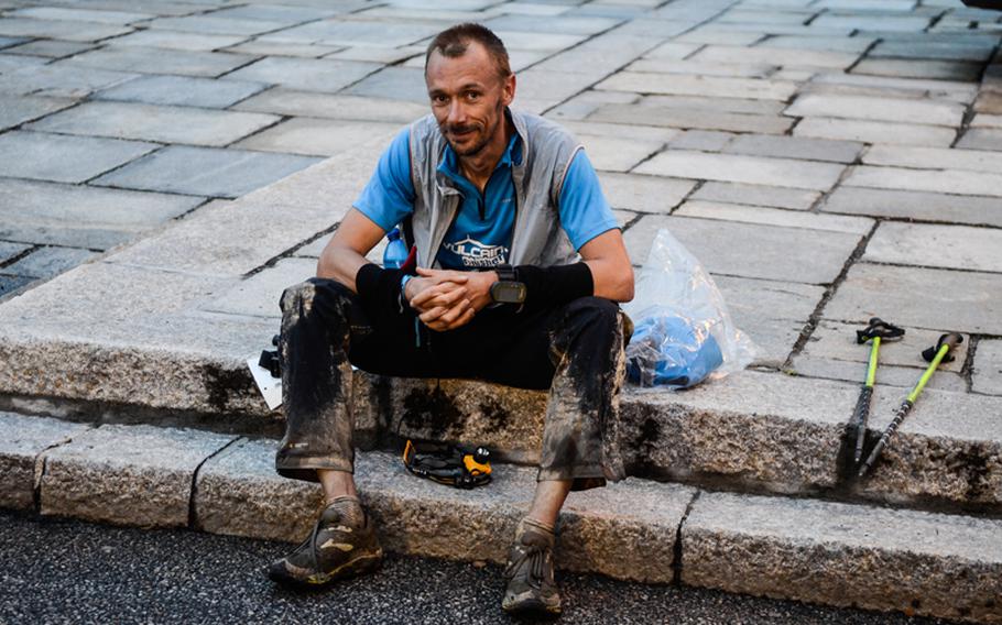 The UTMB TDS race started at 7 a.m. in Courmayeur, Italy, on Aug. 29 and ended in Chamonix, France. Only 43.2 percent of the racers completed the ultramarathon this year, one of whom is seen resting here.