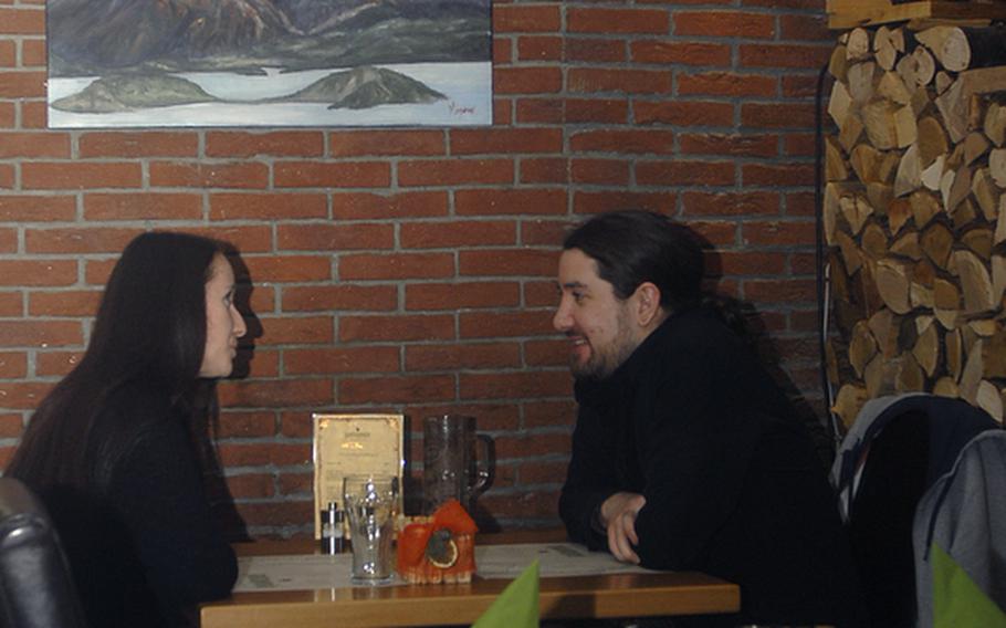 A couple enjoys a romantic night out in early December 2012 at Patagonia Steakhouse in Mainz, Germany. The restaurant, located in the Neustadt section of the city, is known for its steaks and Chilean cuisine.