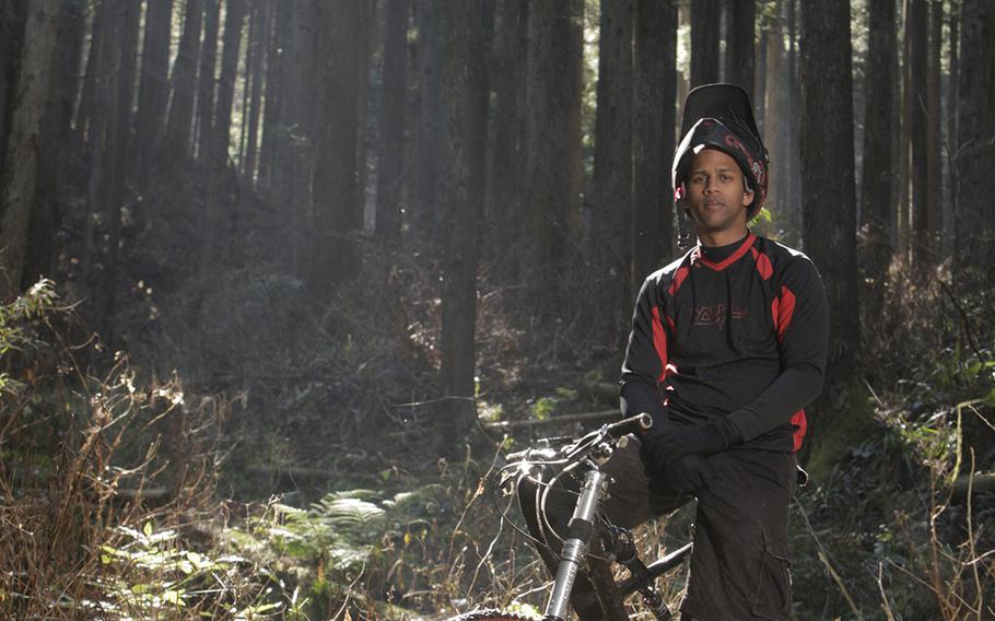 Johnmarth Perez rides the final leg of "The Forgotten Trail" in Hinonde, Japan, on Feb. 4. Perez is relatively new to mountain biking, but not cycling, and as he transistions from his road bike, this trail helps to develop his climbing chops.