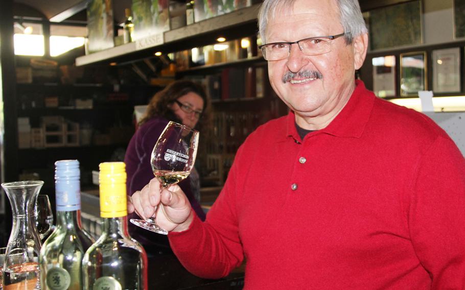 Walter Bitsch, sales director of Bergsträsser Winzer eG, samples some wine at the co-op.
