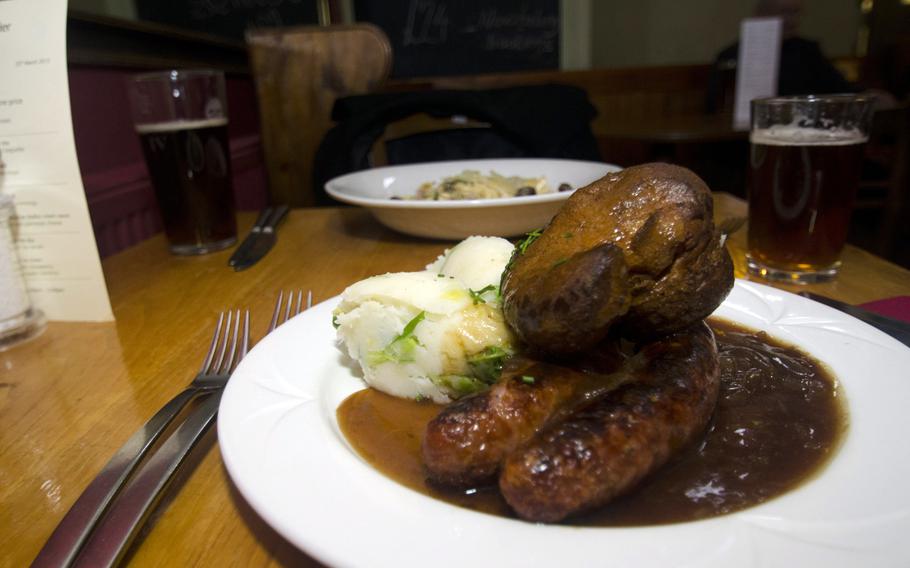 The sausage-and-mash warmer at The Old Cannon comes with colcannon and English pudding. Entrees are also available as a smaller portion.