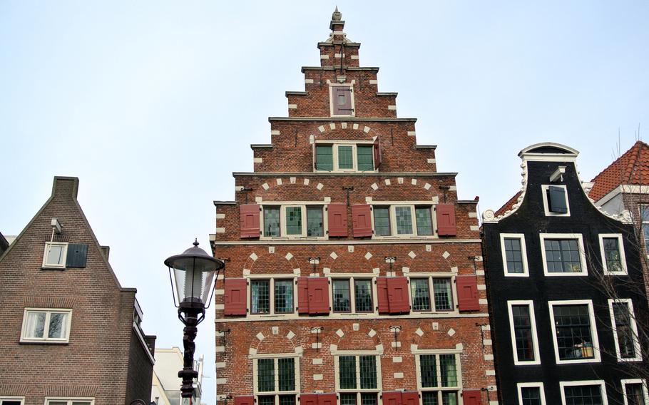 The typical gabled canal houses of Amsterdam.