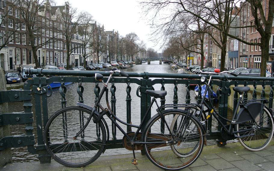 A typical image of Amsterdam: bicycles locked to a bridge over one of the city's famed canals.