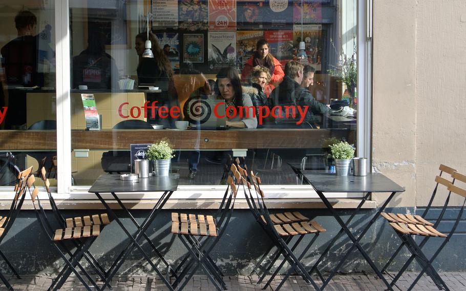 An Amsterdam cafe was abuzz on a recent late Saturday morning, although it was still too cool to sit outside.