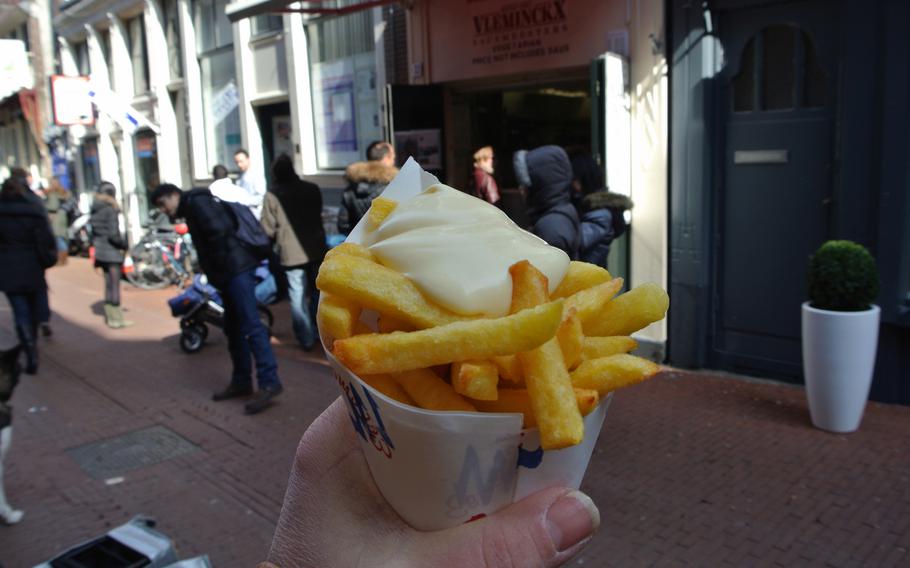 In the photographer's opinion, these french fries, or "Flaamse frits" — Flemish fries, in Dutch — are the best in Europe. They are served from a hole-in-the-wall on a narrow lane near Amsterdam's Spui square.