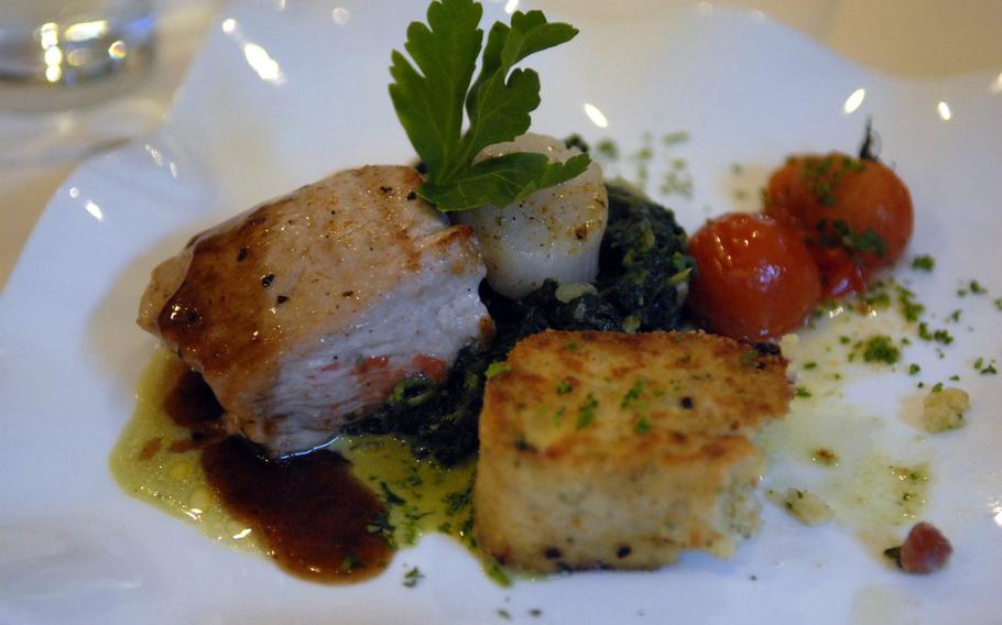 A veal filet and mussels on a bed of spinach was part of a "surprise menu" on a recent evening at Krossis, in Schopp, Germany, near Kaiserslautern. An English menu is available, and offerings include  appetizers, salads and ice cream for dessert, coffee drinks, wine and beer. 