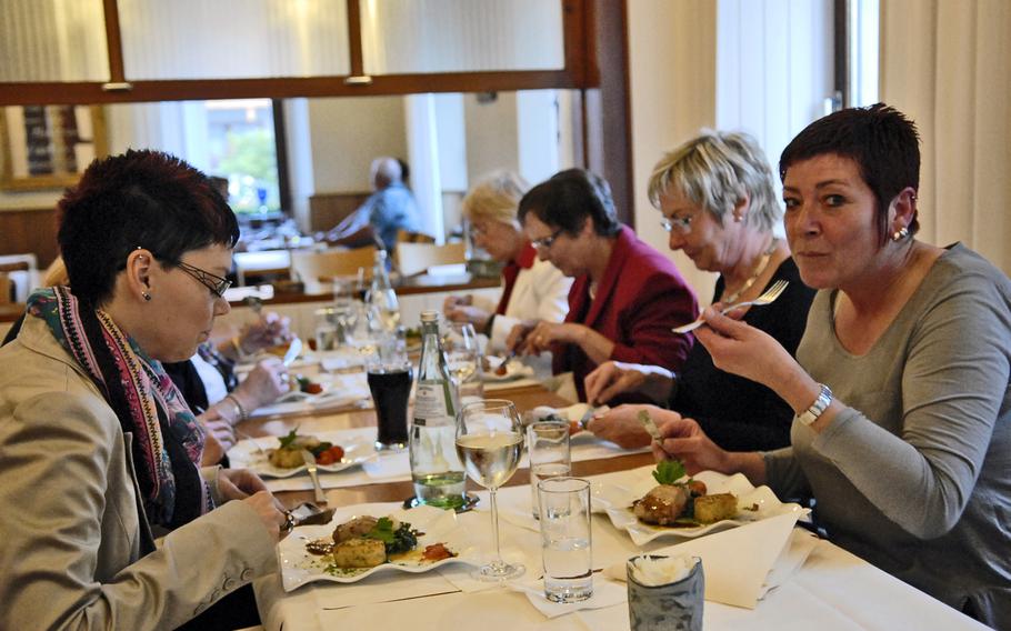 Diners celebrate a birthday at Krossis, a restaurant in Schopp, Germany. The restaurant will create special occasion menus based on what your party likes. Be sure to make reservations for a large group.

Jennifer H. Svan/Stars and Stripes