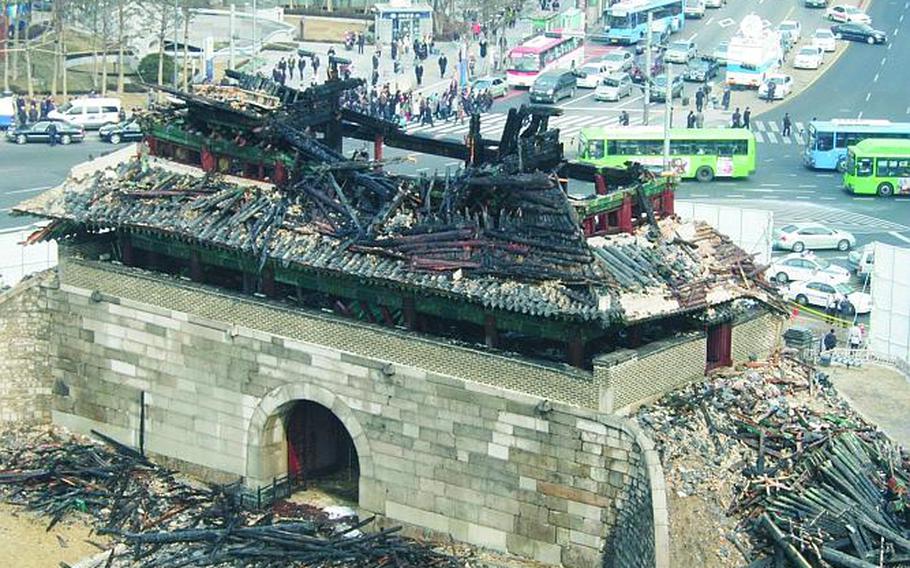 An aerial view of the charred remains of Seou's Namdaemun Gate following a fire in February 2008.