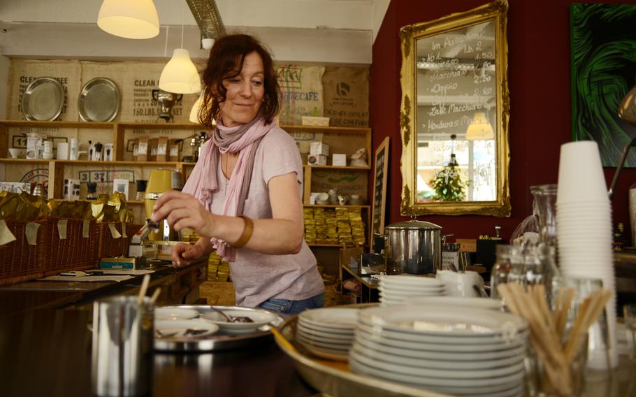 Stephanie Bebensee works behind the counter at Kaffeerösterei Kaiserslautern. Bebensee and her husband, Christian Bebensee, opened the store in October.