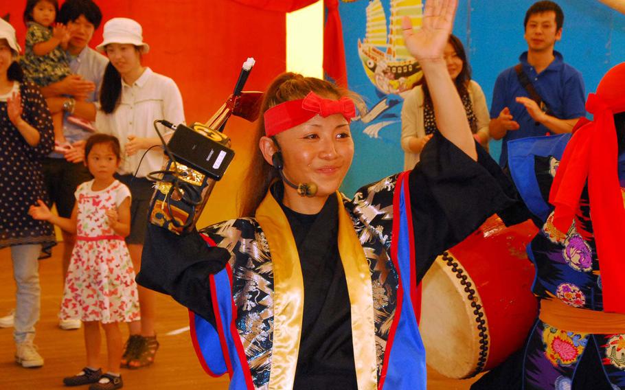 The island's traditional eisa dancing is part of the Okinawa World experience.