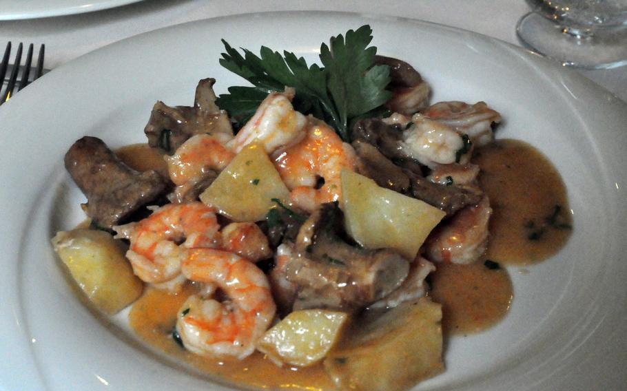 One option on the standard menu at Hostaria Via Caprera in Vittorio, Veneto, Italy, is a dish that's far from standard Italian fare: grilled shrimp with potatoes and mushrooms. Other second-course options include horse steak, beef stewed in beer and tripe.
