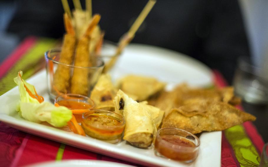 The appetizer plate at thaicafe in the Chiaia district of downtown Naples, Italy, offers a small mixture of fried spring rolls; meat-filled, fried "croccantini"; breaded shrimp; and chicken satay.

Steven Beardsley/Stars and Stripes