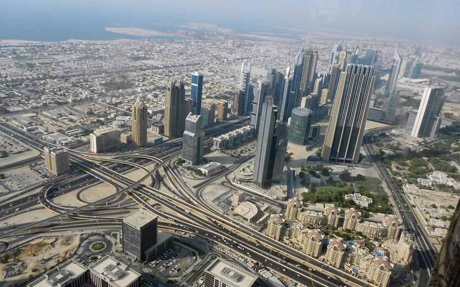 Spaghetti junctions, raised commuter trains and dozens of high-rises sprout from the sand in downtown Dubai.