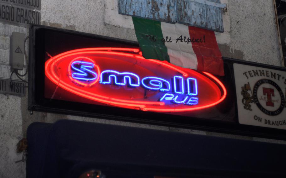 It's not hard to miss the entrance to Small Pub, known to many locals as Bar of the Dead, in Marsure di Aviano, Italy, because it's marked only by a small neon sign.