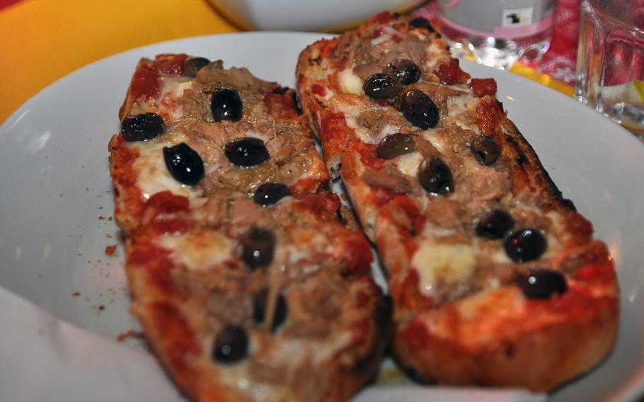 Small Pub in Marsure di Aviano, Italy, not far from Aviano Air Base, offers more than 40 kinds of bruschette,  including this one with tuna, olives and ricotta.