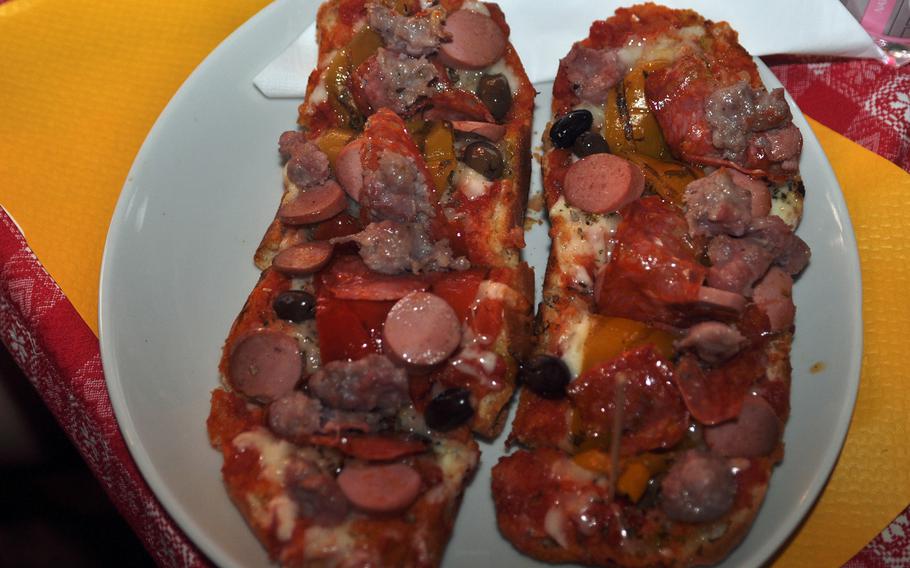 Meat-lovers can try a pair of bruschette at Small Pub that features sausage, wurst, pepperoni and peppers.