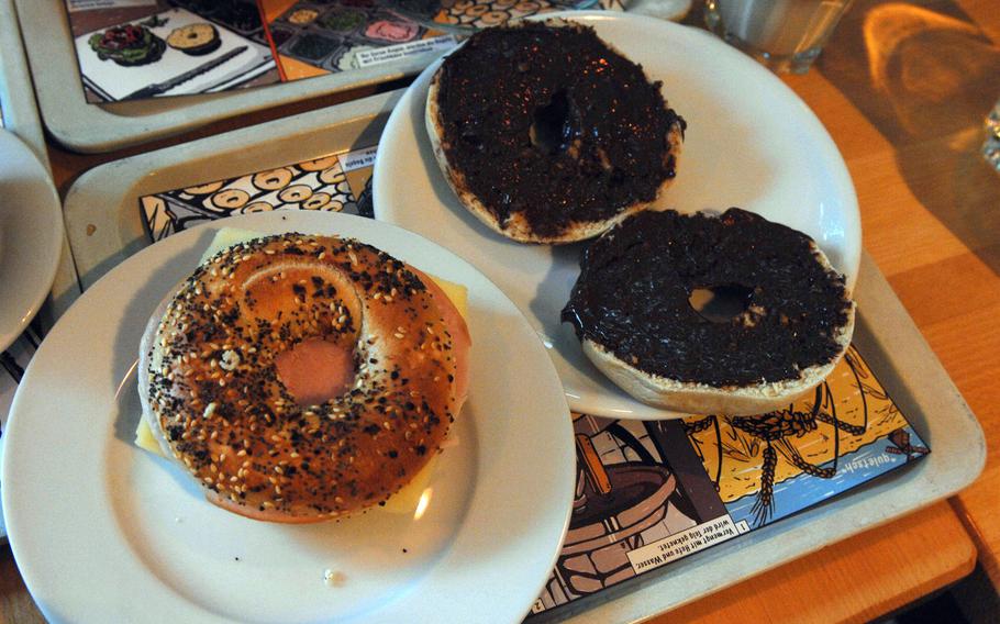 A pair of bagels --  turkey and Gouda cheese on an "everything" bagel on the left, a plain bagel with Nutella on the right -- are served at Bagel Brothers restaurant in Frankfurt am Main, Germany. Bagel Brothers serves high-quality bagels, pastries and coffee in the heart of downtown Frankfurt.